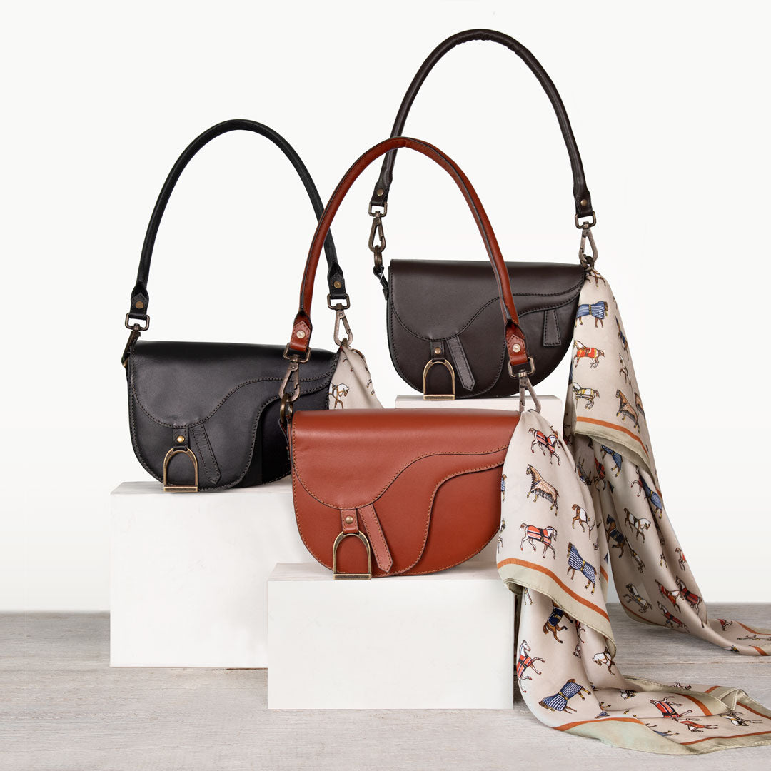 URBAN-EQUESTRIAN crossbody handbags blend horse bit and saddle bag styles in luxury leather. Equestrian purses crafted for barn to brunch style—perfect gifts for horse lovers who value timeless design, modern function, and refined accessories. URBAN-EQUESTRIAN crossbody handbags blend horse bit and saddle bag styles in luxury leather. Equestrian purses crafted for barn to brunch style—perfect gifts for horse lovers who value timeless design, modern function, and refined accessories.