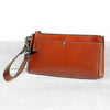 Caravel Wristlet Clutch - Luxury Leather Handbag in Cognac