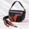 Signature Saddle Bag - Cognac on Black Leather